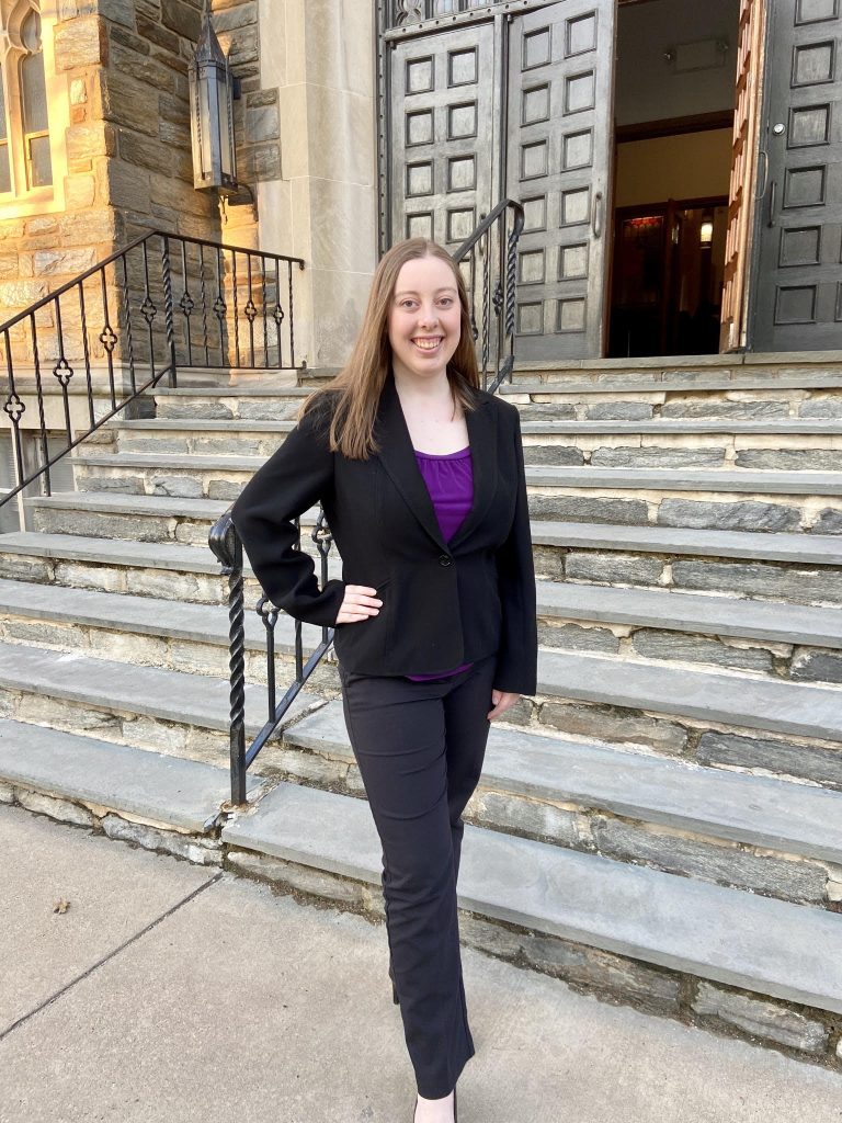 Selfie of Paige in front of Bunce Hall. 