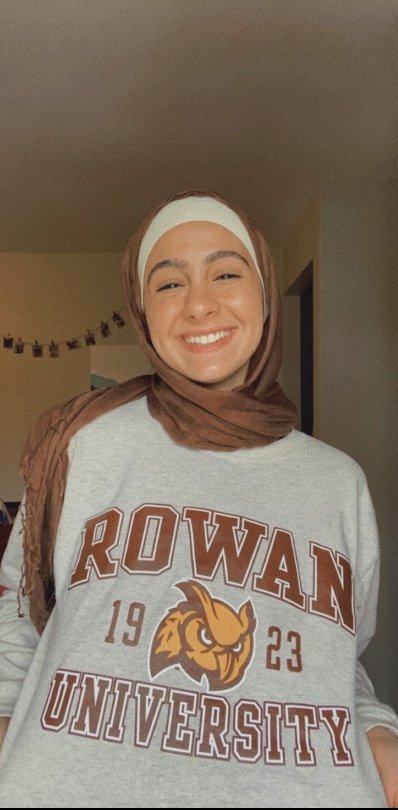 Yasmien poses for a selfie in a Rowan t-shirt.