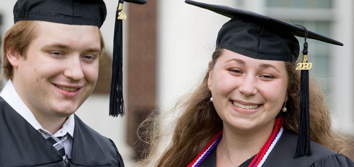 Kira and her best friend Sean stand outside of Bunce Hall