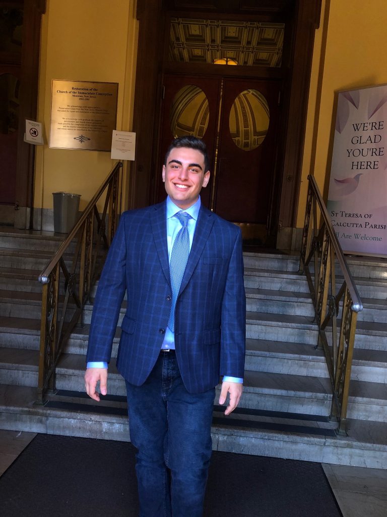 Political science major Brian Kreimer wears a suit