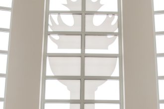 Torch image in the lobby of Campbell Library.
