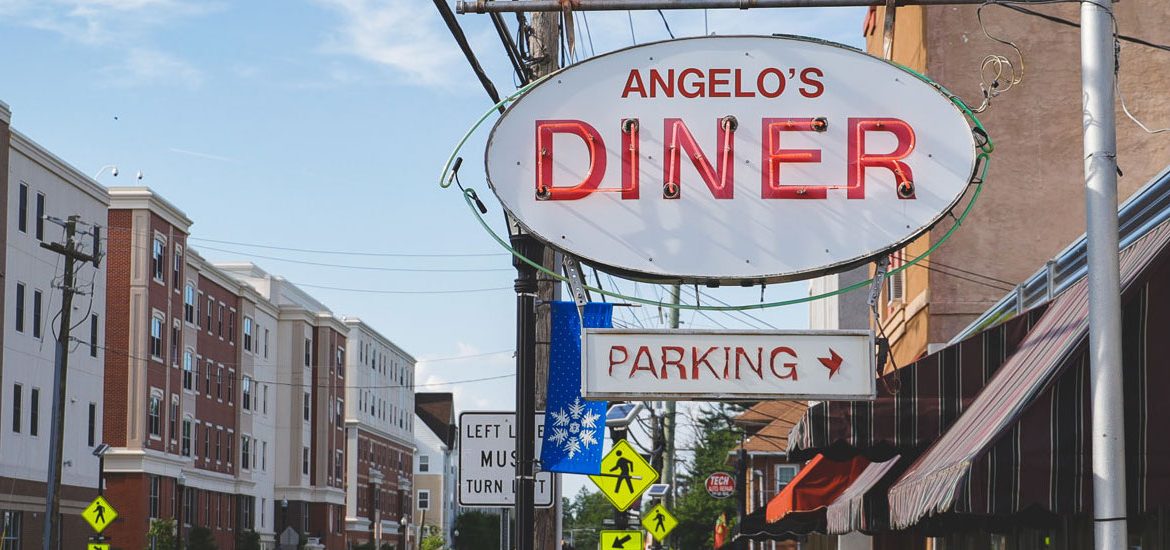 External shot of Angelo's Diner and Main St.