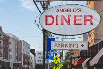 External shot of Angelo's Diner and Main St.