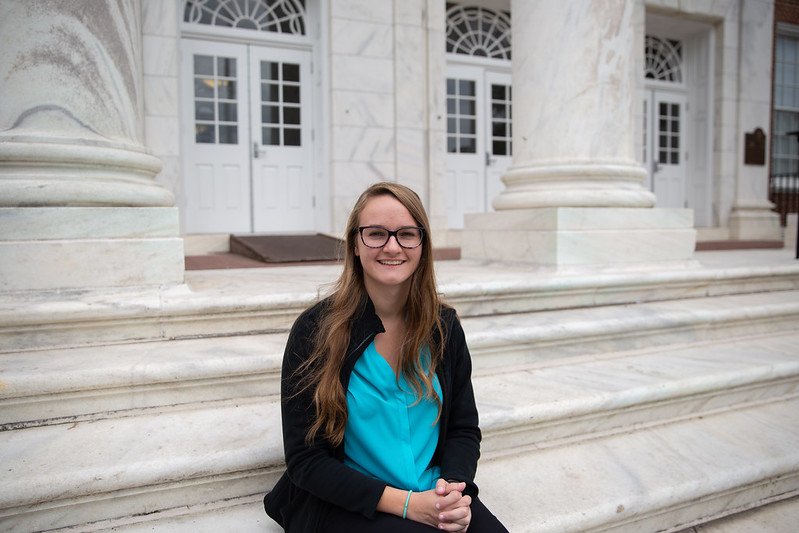 Allison sitting on the Bunce Hall steps.