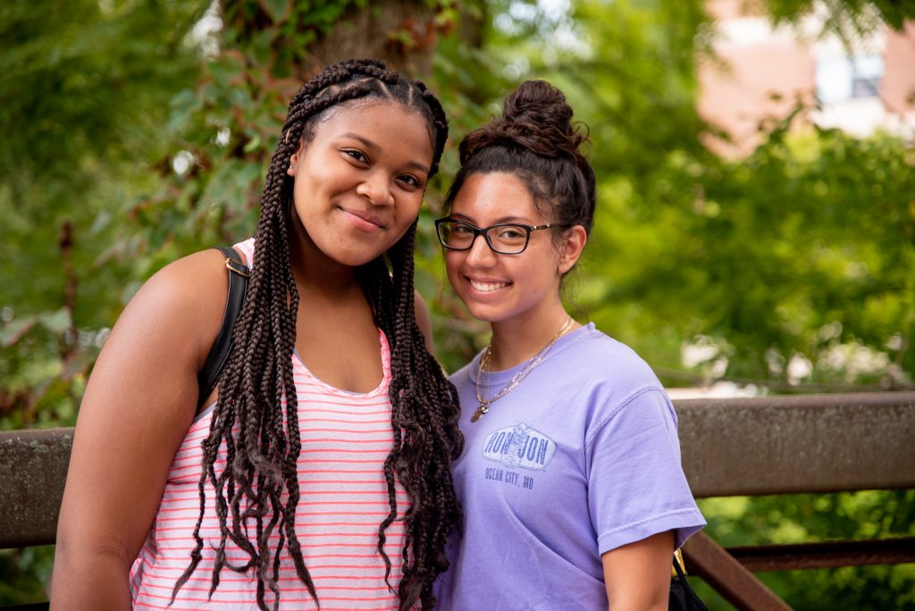 Analiz and Mia hanging out on campus.