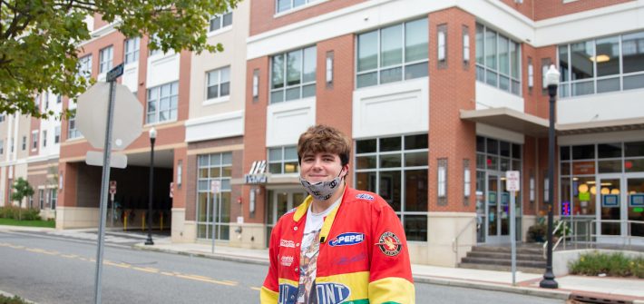 Nick stands on Rowan Boulevard