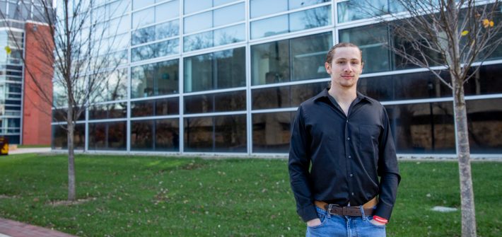 Tom standing outside of the Science building.