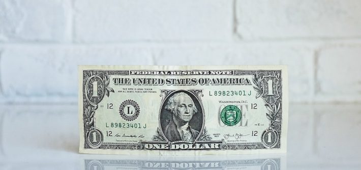 Photo of a one dollar bill.