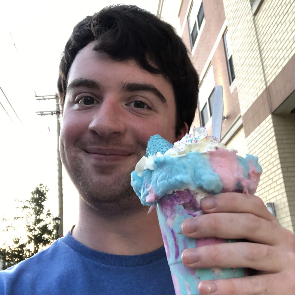Alex poses with an ice cream cone.