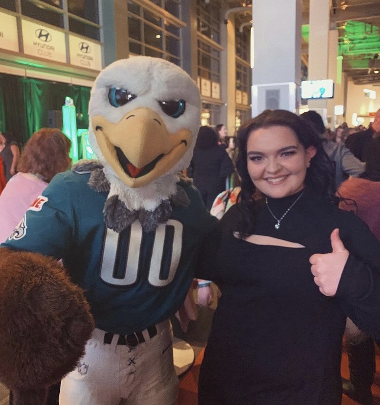 Jennifer poses with the Eagles mascot.