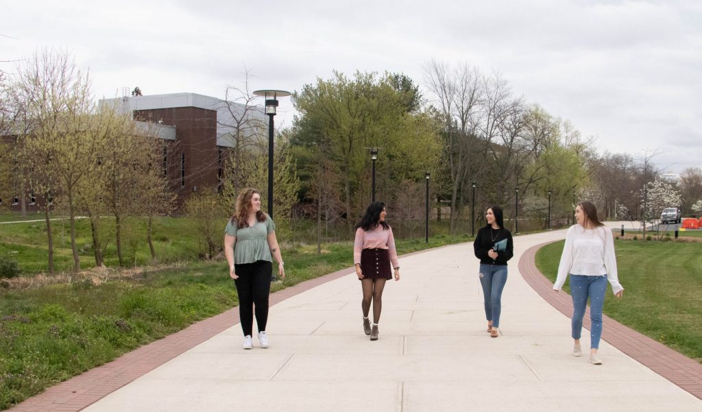 The Steminist Squad walks to Business Hall.