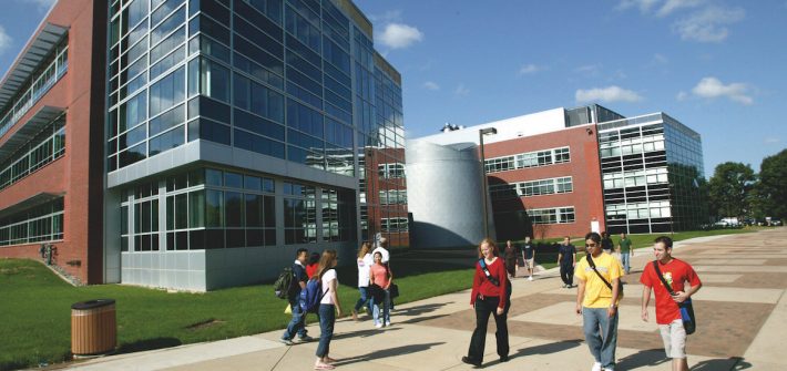 Exterior shot of students walking past Science Hall.