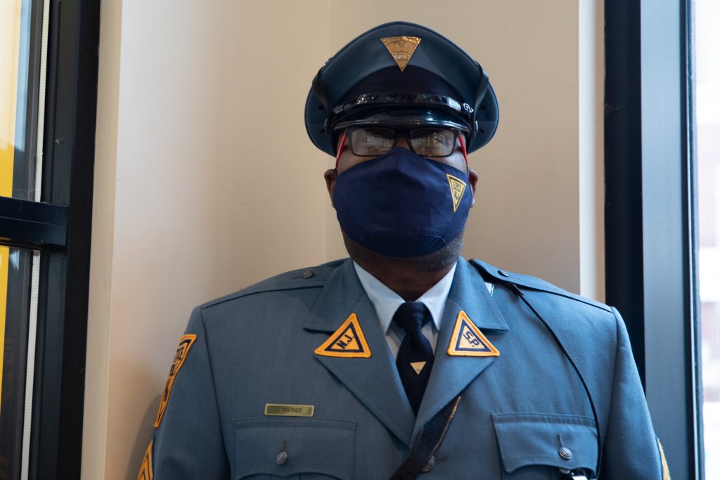 Headshot of Sgt. Barnes wearing a state police mask.