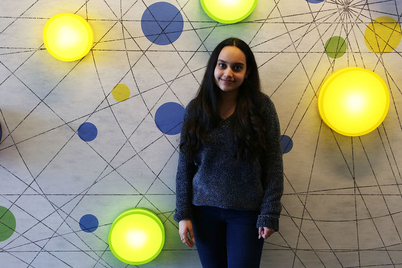 Roshni stands inside Science Hall.