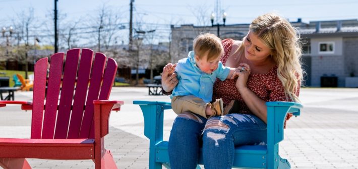 Victoria sits with her son, Rowen.