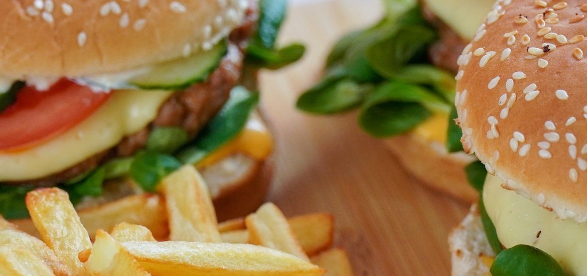 Stock image of burgers with a side of French fries.