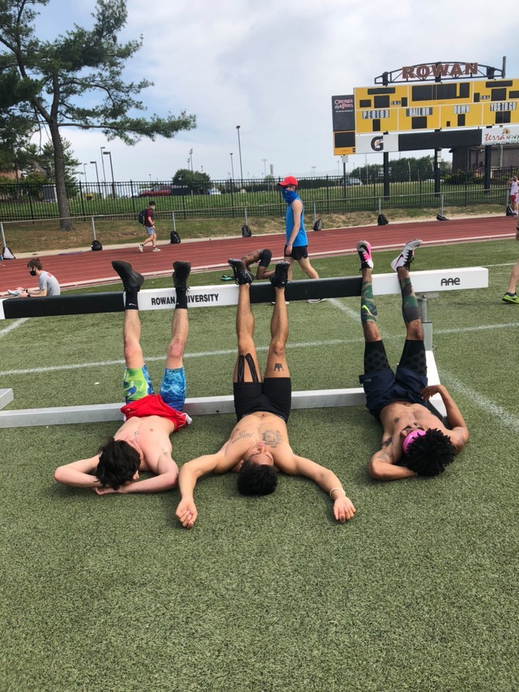 Jah'mere with two friends after a hard track workout.