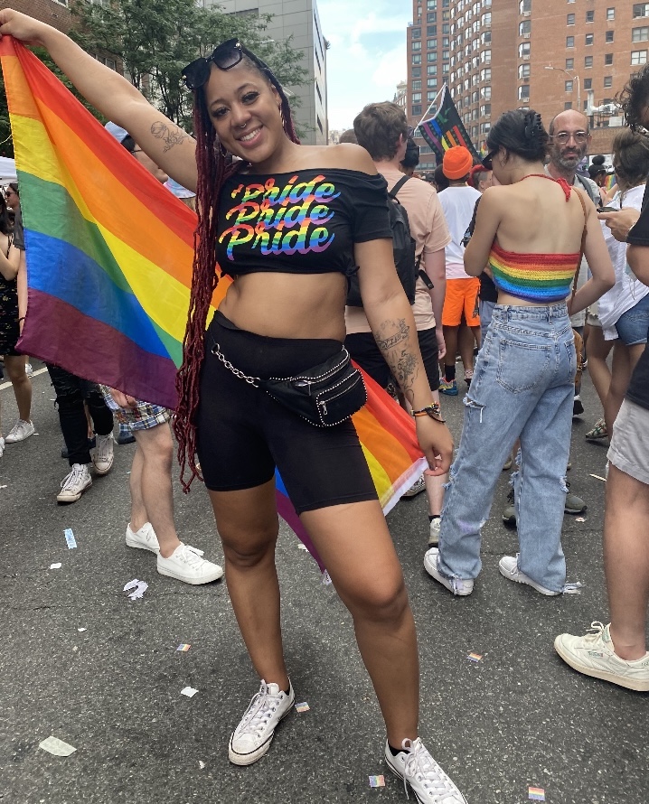 Ayanna wears a Pride flag at the New York Pride Parade.