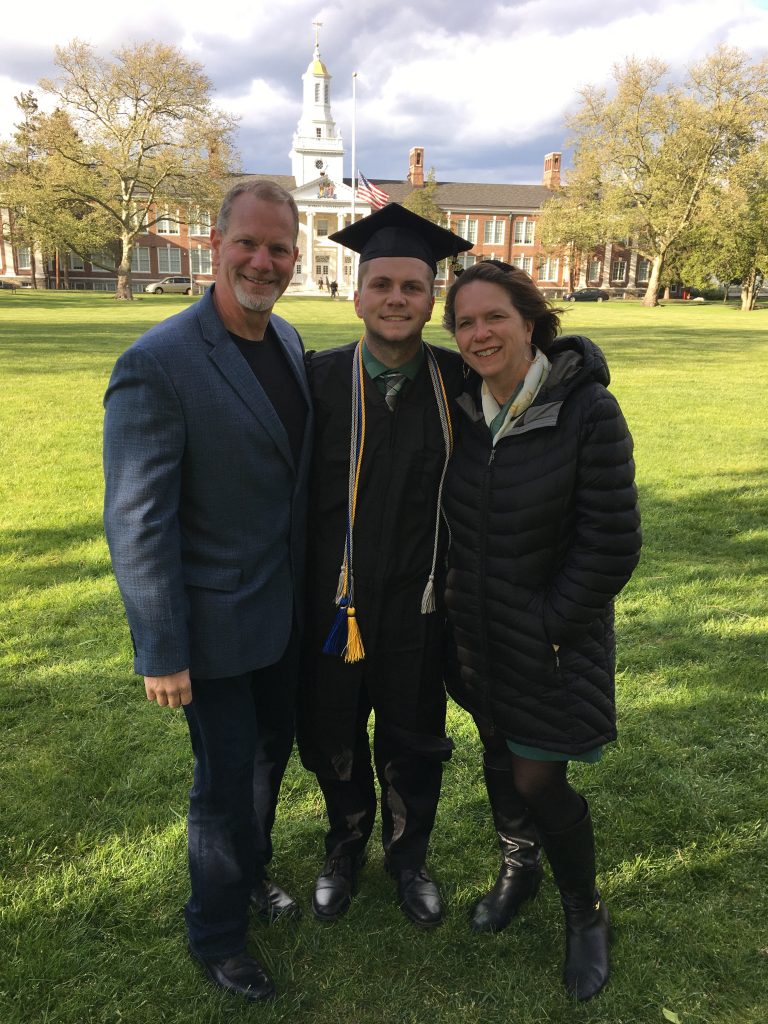 Sean at graduation with parents Maureen and Stacy.