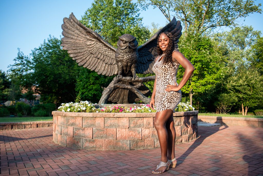 Keyanna Meade in front of Prof Statue.