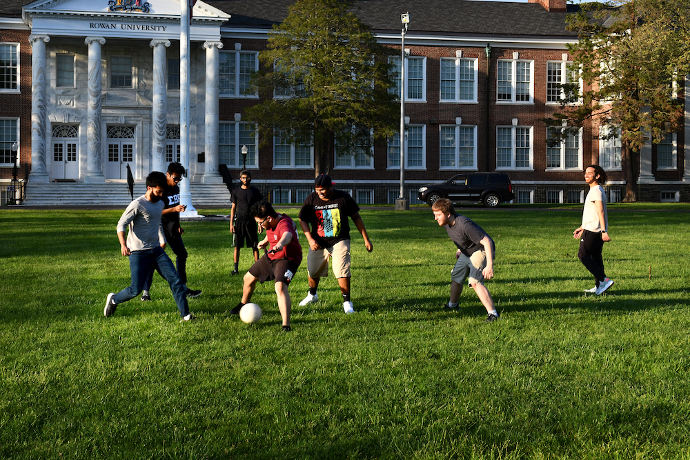 Students play soccer on Bunce Green.