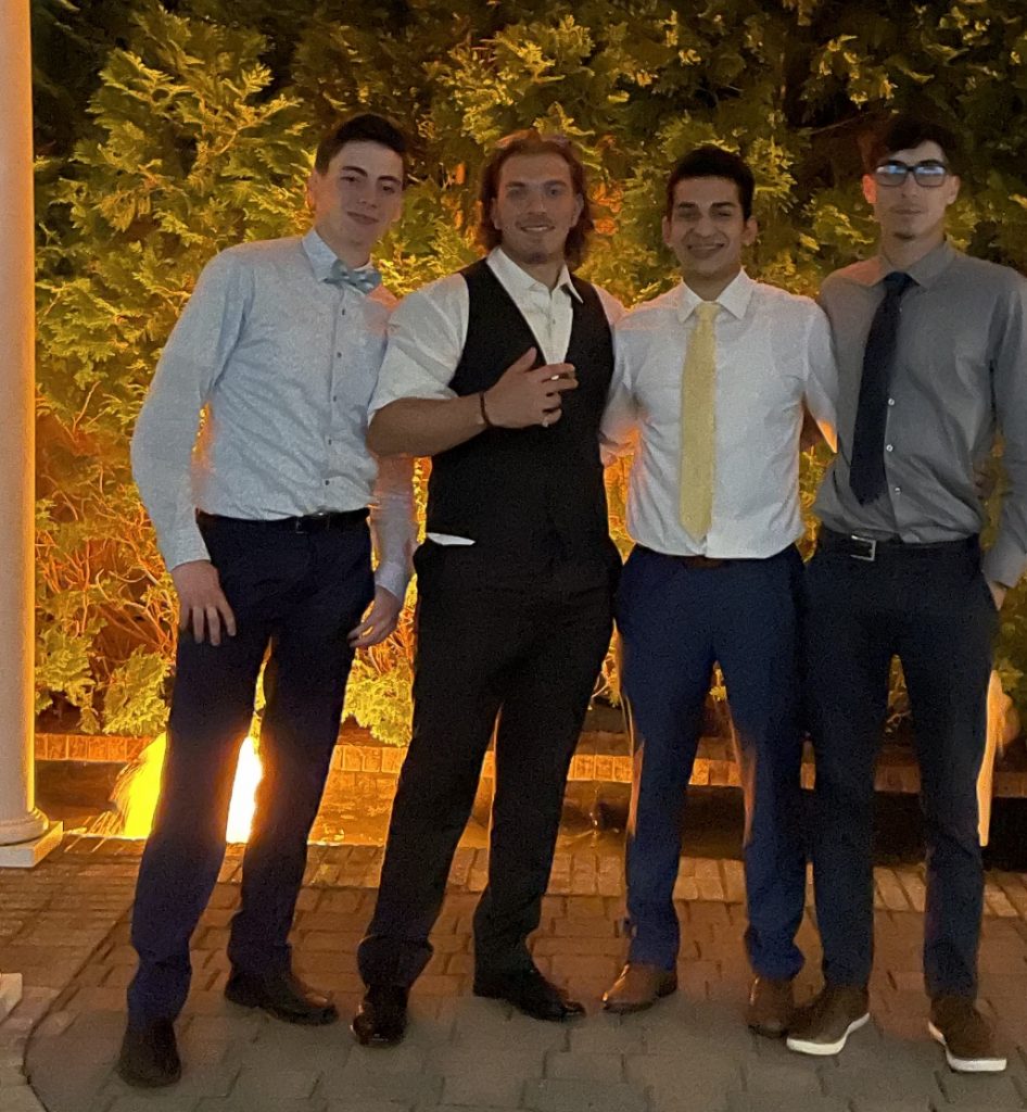 Andrew (left)with friends Brandon, Tyler, and Joey at Joey's sisters wedding.