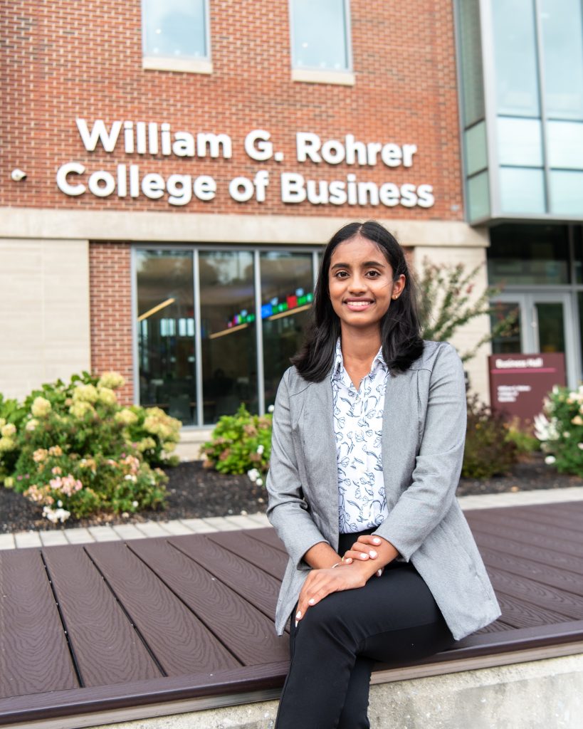 Sasmita Prabu outside College of Business.