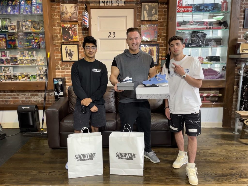 Christian Giannola (right) and his partner Arjun Mansukhani (left) dropping of a few pairs of shoes for Mike the Situation [Jersey Shore] and his new born.