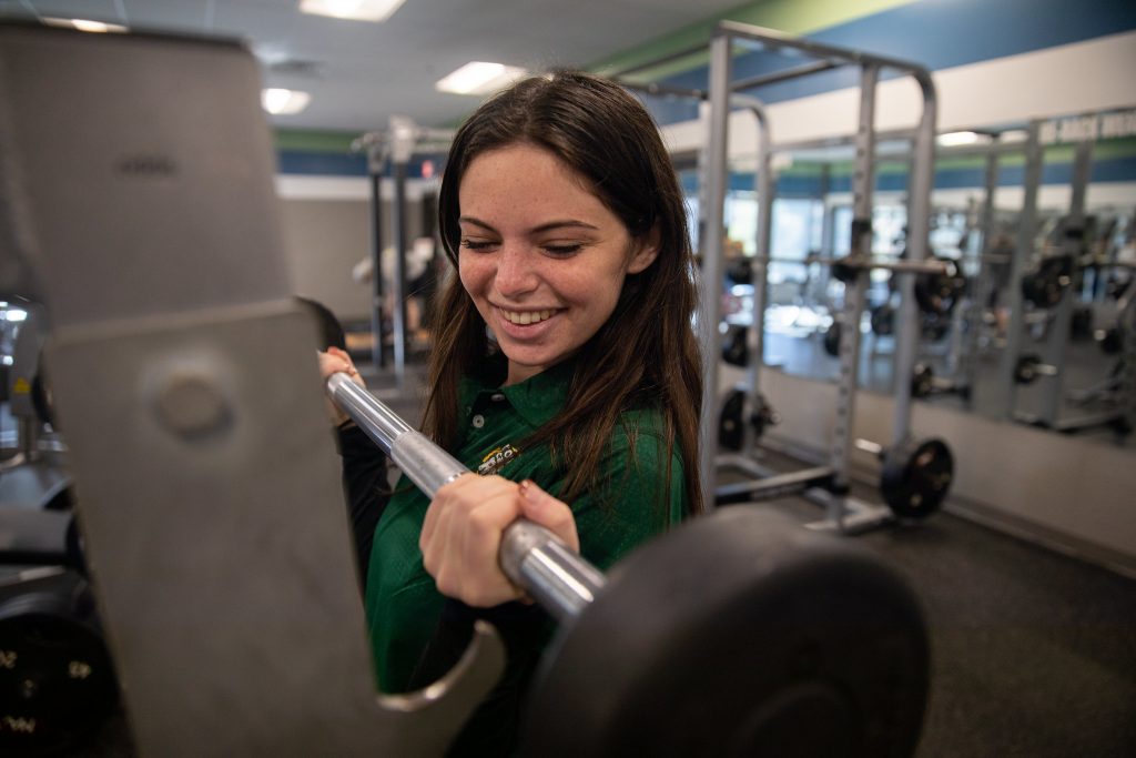 Katie Baker lifting weights