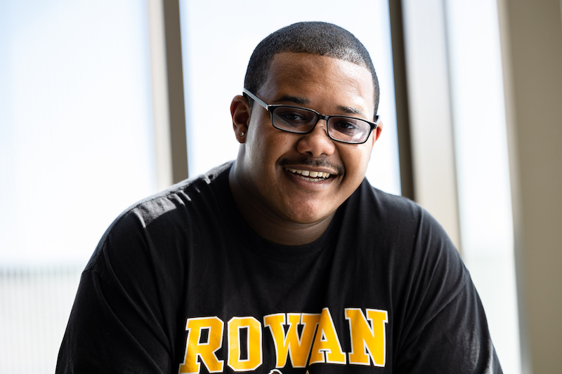 Portrait of Jamar smiling, wearing a Rowan shirt.