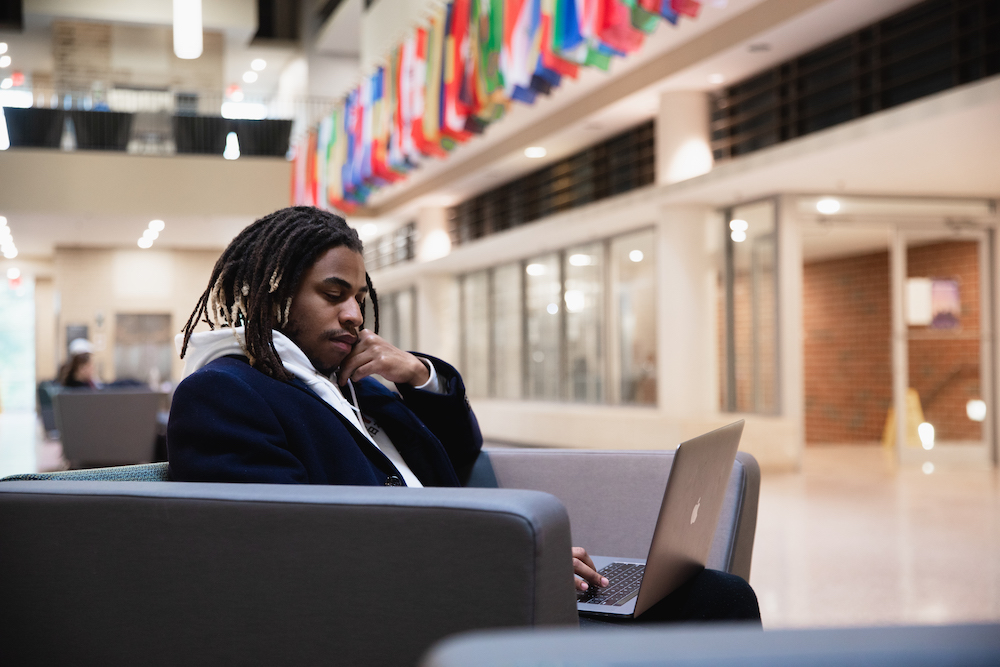 Cris studying in James Hall.