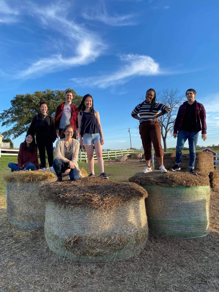 Lia Boncoeur (second from far right) with the graduate clarinet studio at University of Michigan. Michelle Ho,(far left in back) Emmei Ji (second from far left in back) Jesse Bruer (third from far left in back) Elle Crowhurst (far left in front)  Zih-Syuan Hsiang (second from far left in front), and Alex Gutierrez (far right). 