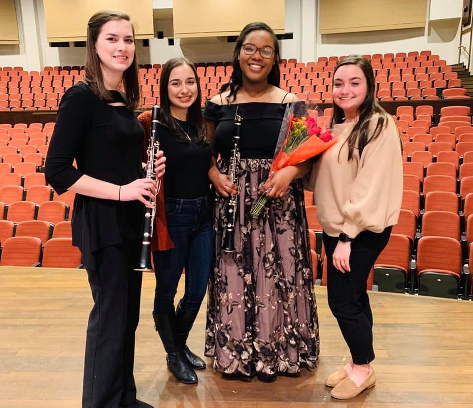 Lia Boncoeur (second from far right) with Rowan University studio members Liz Cicali (far left), Veronica Menna (second from left) and Lisa Harkisheimer (far right) after a concert performance with the Rowan University Orchestra. 