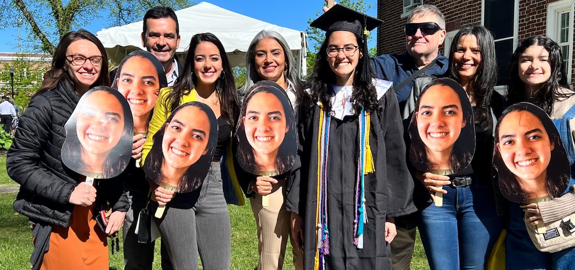 Danielly celebrates commencement with her family.