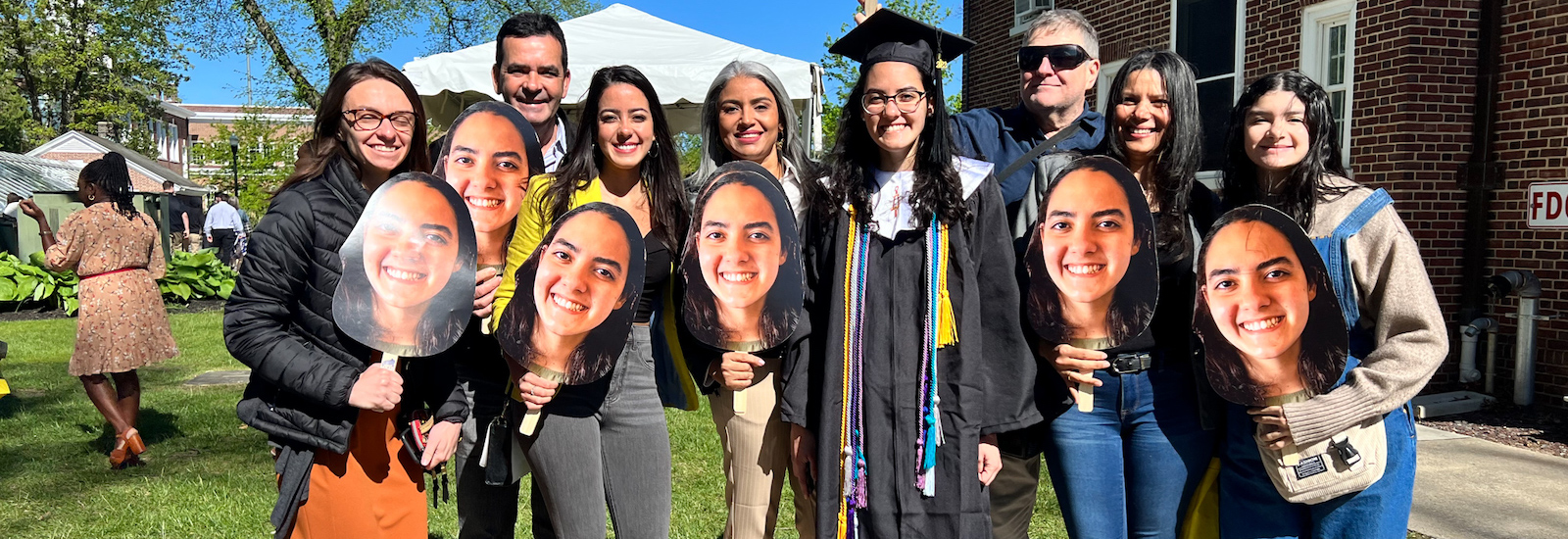 Danielly celebrates commencement with her family.