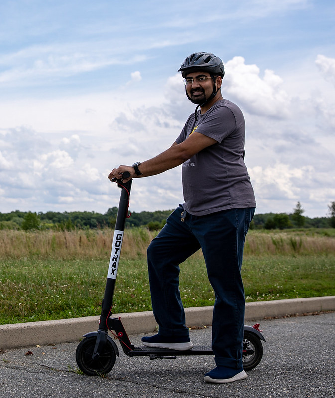 Amit on campus via his scooter.