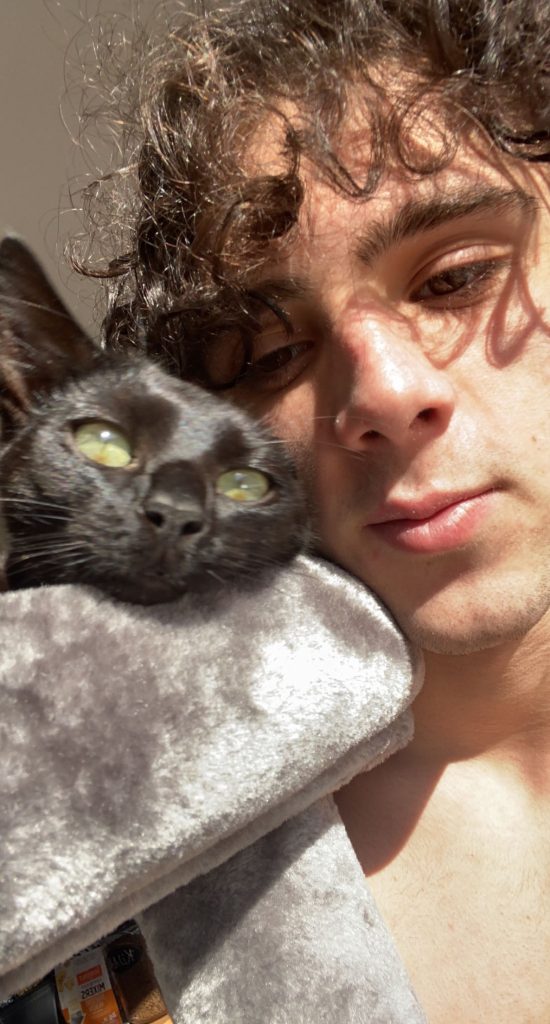 Jake Larocca with his cat.