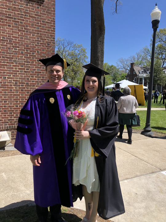 Carly poses with Dr. Joseph Higgins.