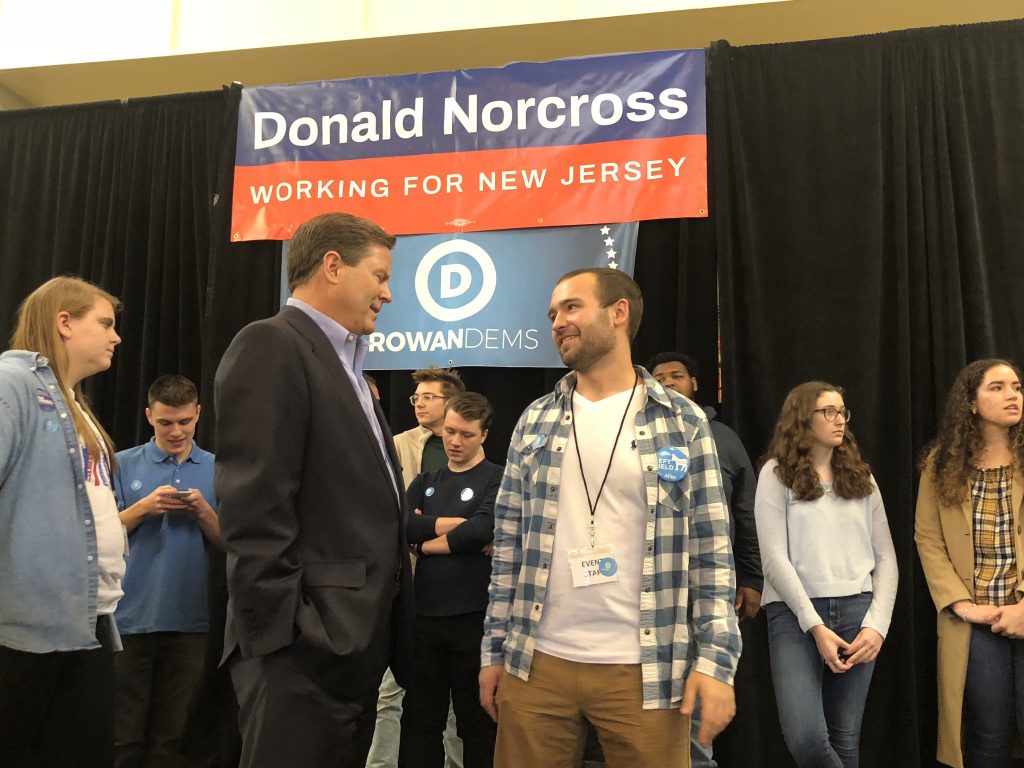 Conor and Congressman Norcross talking after a rally.