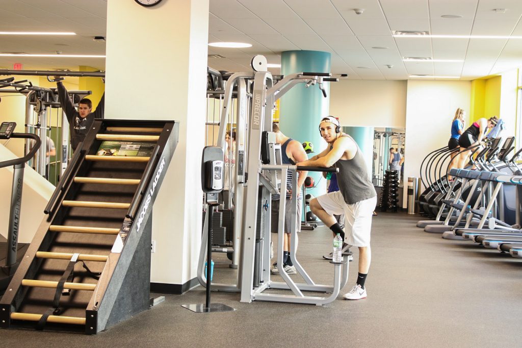 A student working out at the Rowan Fitness Center.