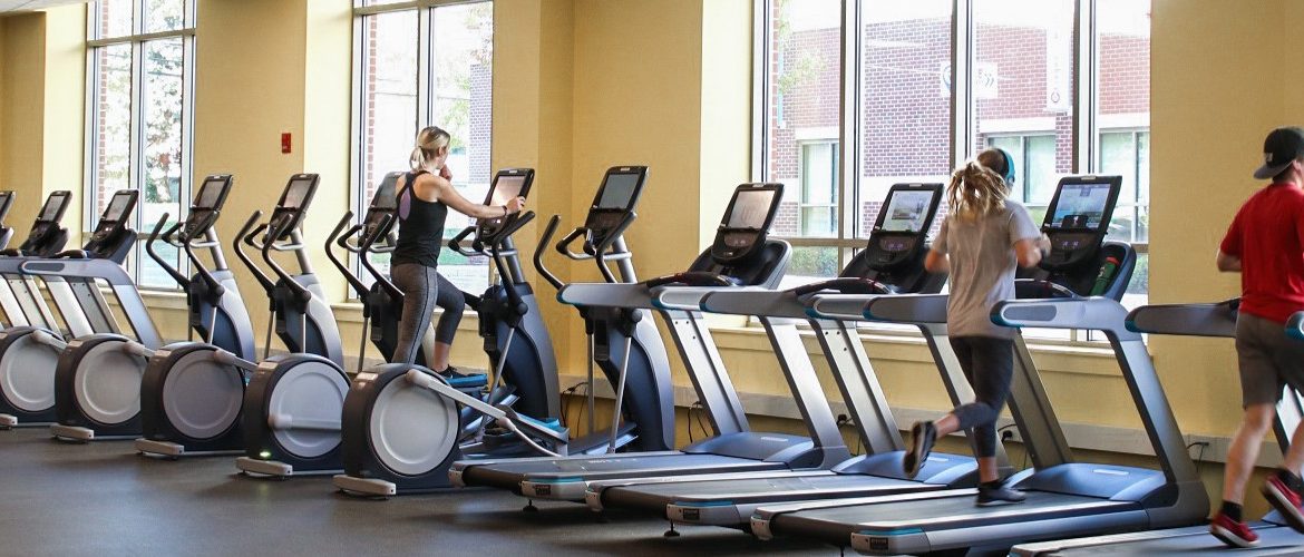 Rowan students running on the treadmills of the Fitness Center.