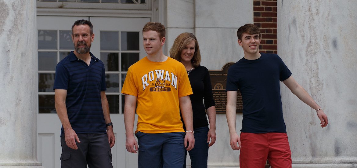 Rowan parents and their children stand on Bunce steps.