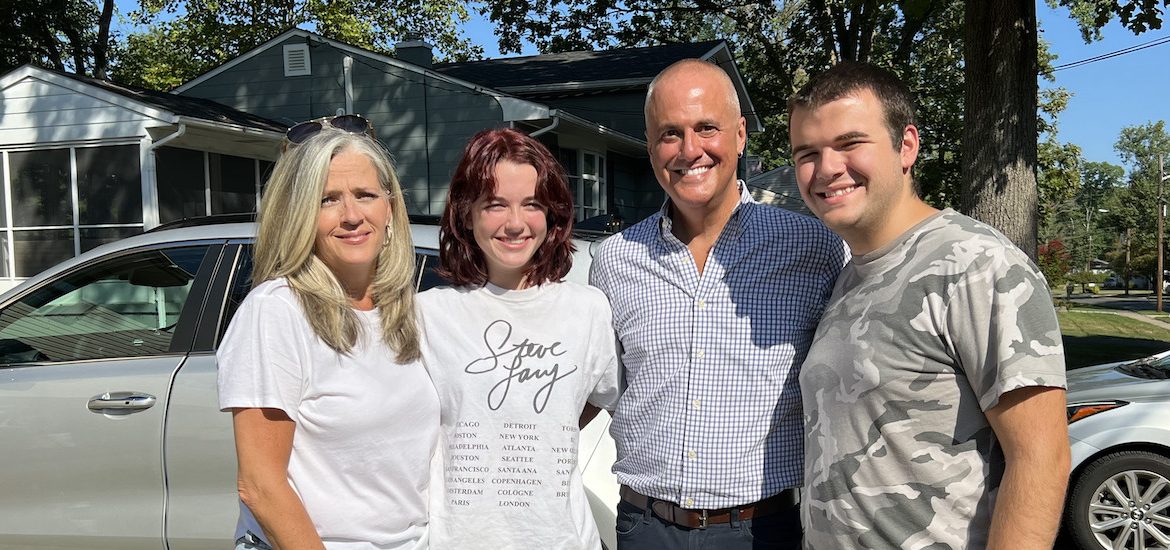 Kim stands with her family on Connor's move in day.
