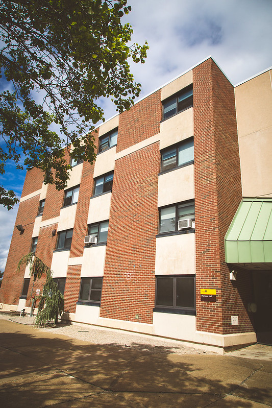 The exterior of underclassmen dorm Mimosa Hall. 
