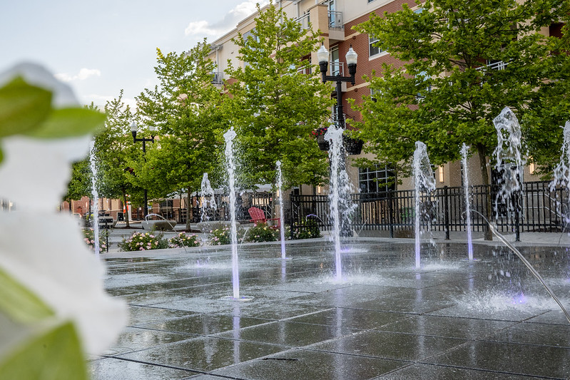 Water fountains spray water upward on Rowan Boulevard. 
