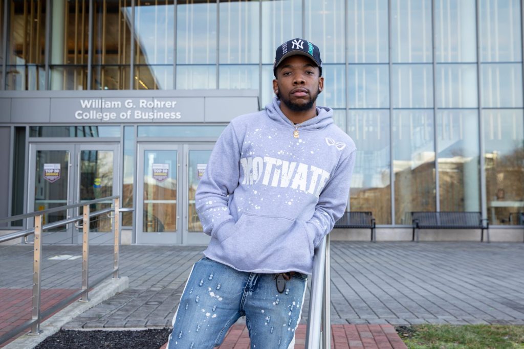 Markese Davis outside the William G Rohrer College of Business building.